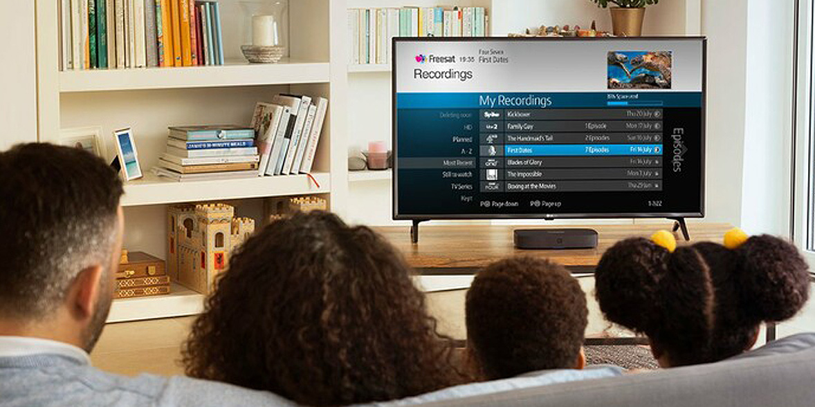 Family watching TV with PVR